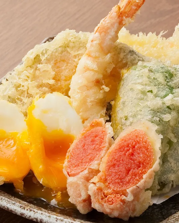 串天ぷらと焼小籠包 食堂◎まるに 天神本店